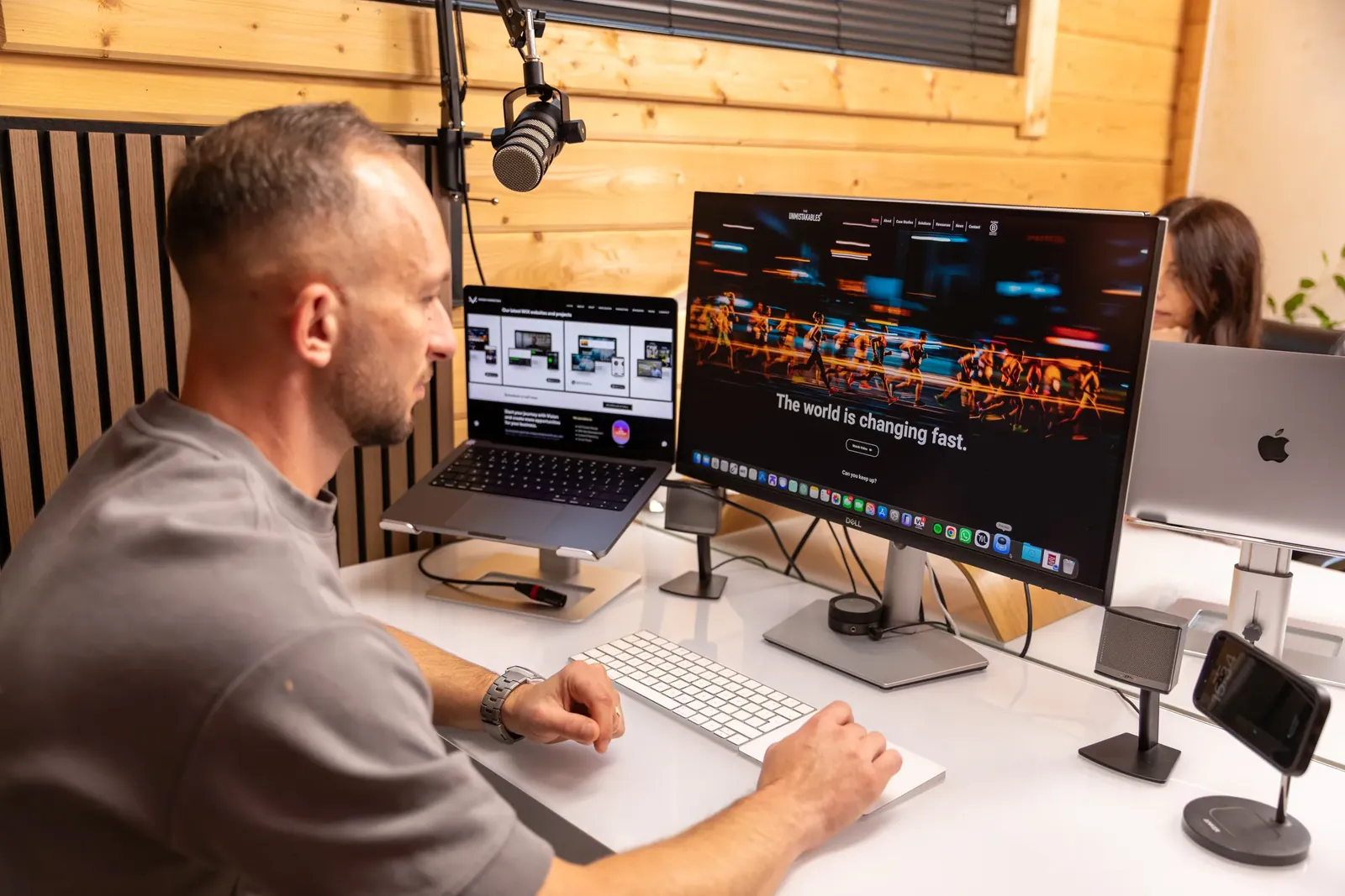 Maciej (Matt) Konarzewski at his desk in the Vision Marketing studio