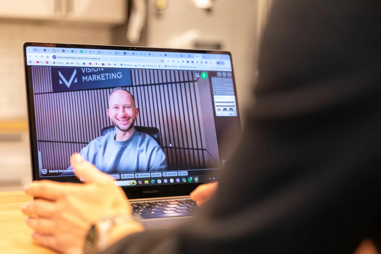A client on a video call with Maciej (Matt) Konarzewski